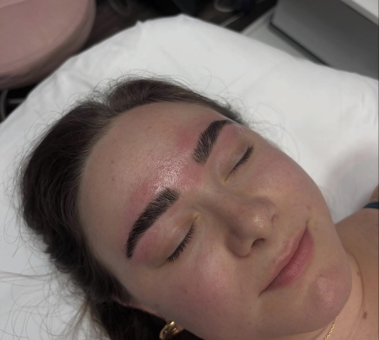 Woman with full, fluffy laminated and tinted brows